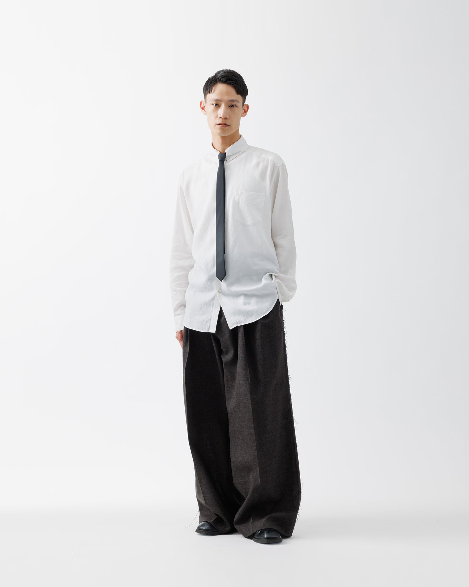 ROUGH WOOL 3TUCK BAGGY TROUSERS .15【DARK BROWN】